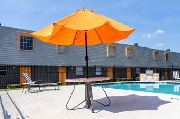 Poolside Relaxing Area at La Bella Apartments, Fort Worth, 76116